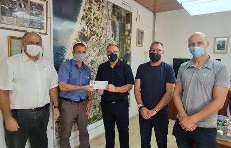 מועדון רוטרי קישון העניק תווי קניה לתלמידים נזקקים